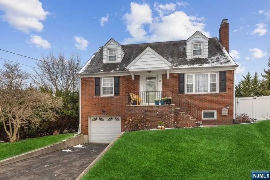 Great location on a dead end street close to the Wycoff border! When you enter this move in ready cape you will notice hardwood floors throughout the first floor. The main floor features a living room with a fireplace, 2 Bedrooms, 1 updated bathroom, and a MEIK. The basement is finished, ready for entertainment! As well as a great laundry area with tons of storage and countertops. The backyard is huge, fully fenced in and perfect for enjoying the outdoors on the patio or lawn! Close to shops, Schools, house of worship and NY Transportation. BONUS: Attic is very large and used for storage, possibility of turning this into a bedroom. Double Bonus: Attached Garage has entrance to the home!