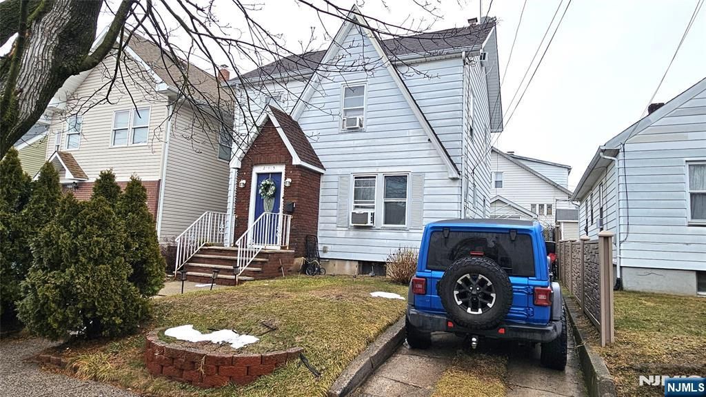 Photo of 213215 Vernon Avenue, Paterson, NJ 07503 (MLS # 26007380)