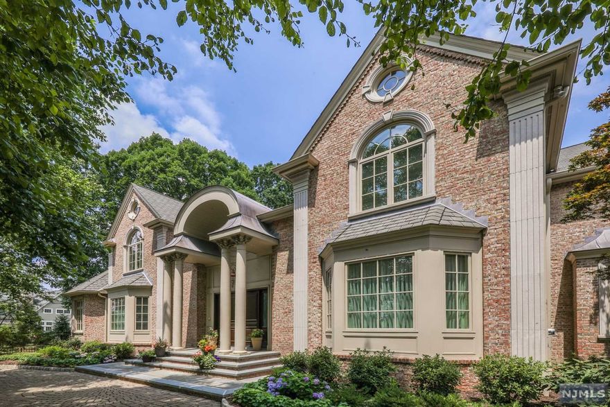 THE EPITOME OF CLASSIC LUXURY. YOUR OPPORTUNITY TO LIVE ON ONE OF THE MOST SOUGHT-AFTER STREETS IN BERGEN COUNTY. OVER 11,000SQFT OF LIVING SPACE, 4+ CAR ATTACHED GARAGE, OVER 1.3 ACRES, HEATED IN GROUND POOL, OUTDOOR CABANA, AND MANY MORE GRANDIOSE FEATURES. AMAZING ENTRANCE FOYER WITH A GRAND CIRCULAR STAIRCASE, COMPLIMENTED BY A FORMAL LIVING ROOM, MUSIC ROOM, FORMAL DINING ROOM, OFFICE/STUDY, OVER-SIZED MODERN EAT-IN KITCHEN (BREAKFAST AREA & WALK IN PANTRY). SECOND FLOOR BOASTS A LARGE MASTER SUITE WITH A CUSTOM FIREPLACE, LUXURIOUS SPA LIKE MASTER BATHROOM (WHIRLPOOL TUB & STEAM SHOWER) & FOUR ADDITIONAL EN-SUITE BEDROOMS. ADDITIONAL LAUNDRY ROOM ON THIS FLOOR. FULLY FINISHED LOWER LEVEL WITH REC ROOM, BILLIARDS ROOM BEDROOM, FULL BATH, GYM AND WALK OUT TO BACKYARD. EVERY DETAIL IS PERFECTION. BEAUTIFUL LANDSCAPING FOUND THROUGHOUT THE PROPERTY. NOT TO MENTION, BLUE RIBBON RANKED SCHOOLS AND CLOSE TO ALL NYC TRANSPORTATION.