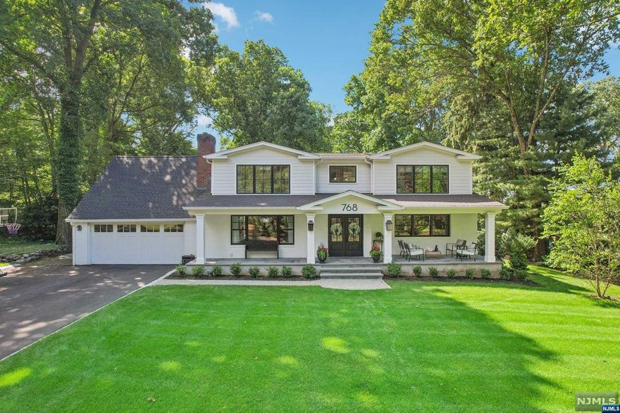 Beautifully updated and expanded 5 Bedroom, 3 1/2 bath home in the sought after Sicomac section of Wyckoff. After entering through the stunning, 2 story entry foyer, the first floor boasts a large formal dining room with wood burning fireplace, a modern, custom kitchen that opens to a spacious great room with vaulted ceilings and wood burning fireplace, and 1 and a half bathrooms, one of which provides easy access to the back yard and pool. The first floor also offers 2 BRs, perfect for a guest room and/or office space. The second floor features a master suite with a large walk in closet and gorgeous, updated master bathroom. There are also two additional, generously sized bedrooms, full bathroom, and large bonus recreational space opening to the living room on the 1st floor. The home is situated on a picturesque piece of property with a gorgeous, fully updated modern pool- all new equipment and liner. Luxury living in a desirable town. New sprinkler system and new FH generator