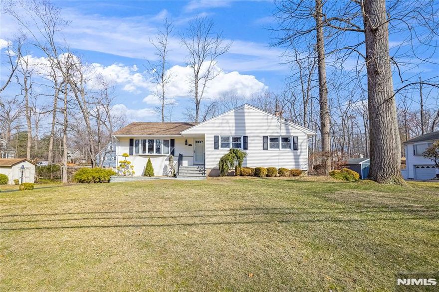 Donâ€™t miss this impeccable raised ranch in Old Tappan, with access to Blue Ribbon schools. Featuring 4 bedrooms, 2.5 baths. The Living and dining room offers surround sound providing both comfort and style. The modern kitchen and dining room open to a raised deck with sliding glass doors, while a second patio off the family room offers additional outdoor space boasting a new bluestone patio. With a 2-car garage (EV charger), underground sprinklers, security system, and upgraded electrical panel with generator hookup, this home has it all. Recent updates include a new furnace, AC, hot water heater, chimney liner, and attic fan. The newly installed bluestone steps, walkway, and patio enhance the exterior. A perfect blend of modern amenities and convenience in a beautiful location. More pics to follow.