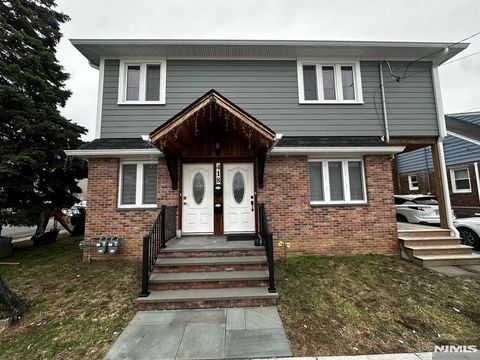 Photo of 418 Madeline Ave, Garfield, NJ 07026 (MLS # 26009085)