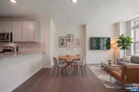 Photo of 67 Arnold Drive #5811, Wood Ridge, NJ 07075 (MLS # 26017591)