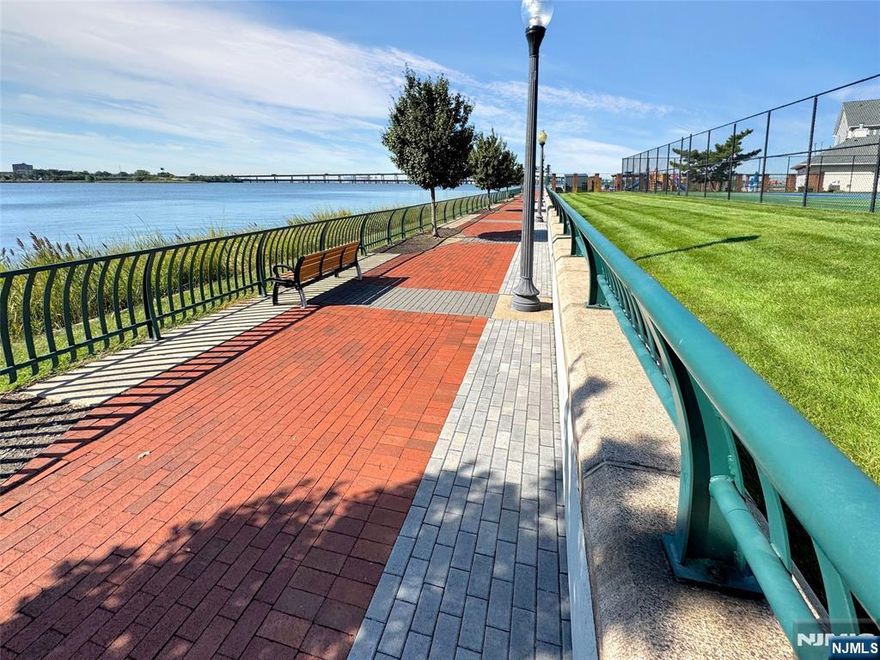 Estate Sale. Spacious 2BR/2BA multi-level townhome located in the sought-after Society Hill community at 20 Redwood St, Jersey City. This gated waterfront neighborhood of townhouses and condos along Newark Bay offers 24-hour security, a scenic promenade, and resort-style amenities including a clubhouse, inground pool, tennis courts, basketball court, tot lot, gazebo, and fitness center. The spacious unit offers approximately 1,400 sq ft with an open living/dining area, modern kitchen, balcony, generous closets, and a primary suite with private bath. Built in 1996, the home includes assigned parking plus visitor spaces. Enjoy peaceful tree-lined streets with convenient access to Journal Square, shopping, dining, and major transit. Pet friendly, parking assigned, plenty to do and so much more. SOLD AS IS.