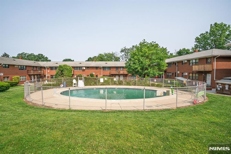 Don't miss the most affordable property in Bergen County! Unbeatable location for effortless commuting! This first floor unit is conveniently located across the street from The Westmont Train Station, NYC express bus & The Rosie Shopping Complex. Right in the front of the pet friendly Terhune Courts Condo complex is this one bedroom unit is full of light. Offering hardwood under the bamboo laminate, marble kitchen flooring, plenty of closets and storage. HOA fee includes heat & hot water, pool, 1 deeded parking space, and convenient onsite laundry area.