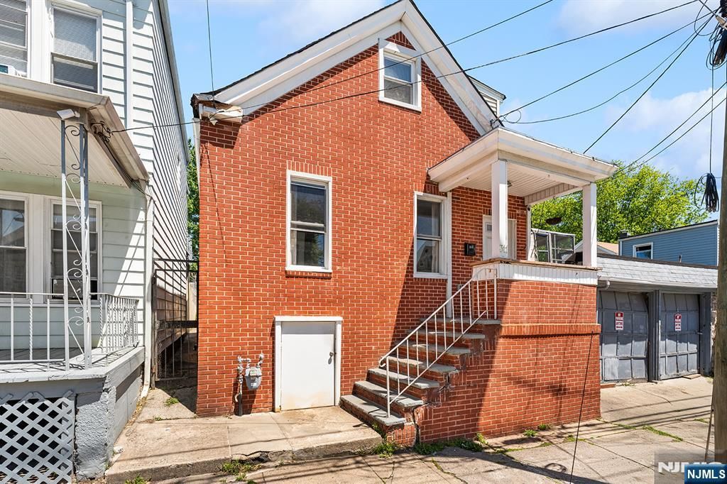 Photo of 311 Paxton Street, Paterson, NJ 07503 (MLS # 26016878)