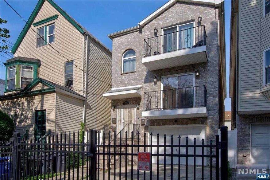 Magnificent newly constructed income producing 2 family home with very large rooms, modern kitchens and baths. It has an exclusive driveway and a built in 2 car-garage, a privacy fence and open porches. The walkout basement is finished for extra living space with 1Br 1Ba, kitchen, living area and laundry. First and second floor has same layout and both has spacious 3BR 2Ba, kitchen, living/dining area and WICs. Total of 7Br 5Ba. Beautiful hardwood floors all throughout and a kitchen that is fully equipped of modern stainless steel appliances. What are you waiting for? Come and send your ojavascript:contMLS(document.Mainform);ffers ASAP!