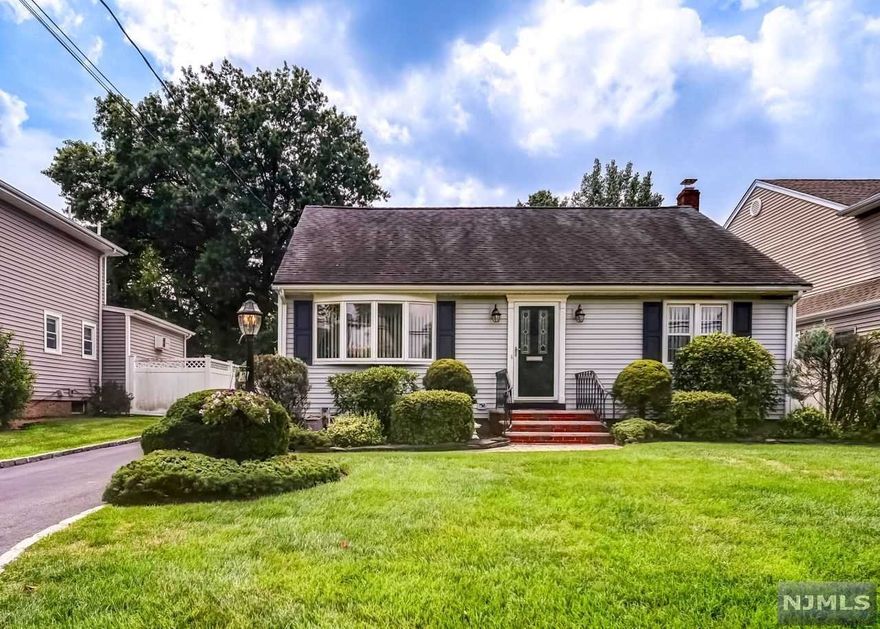 Welcome to this meticulous expanded cape cod style home. This house is a must see...with four generous size bedrooms and two full baths. Enter the inviting living room which opens to the dining room, kitchen and large family room with skylights. Finished basement with laundry room which can be used for office, play room or gym. Central vac, sprinkler and security system are just a few extras that this home offers. Close to schools, shopping, restaurants and public transportation. This well maintained home is being sold by the originally owner and shows pride of ownership...Come see for yourself!!