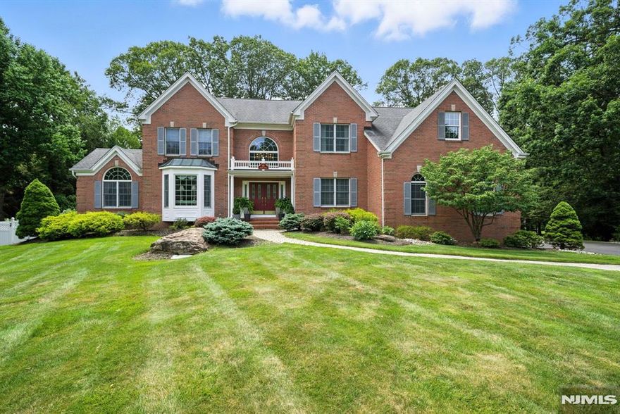 Nestled in one of Morris County's most desirable towns, this stunning Colonial offers an upscale lifestyle on a quiet cul de sac amid an enclave of luxury homes. Backyard oasis with in-ground pool and jacuzzi. Stunning, custom colonial on nearly an acre. A striking 2-story foyer announces the home's modern elegance. The entry is flanked by a spacious dining/living room & office. The hub of the home is the family room w/cathedral ceilings & a gas burning fireplace which opens to the large kitchen with oversized center island. Great space & floorplan for entertaining guests. Bonus den or reading room. The curved front staircase is 1 of 2 that lead to the 2nd level. Upstairs you'll find an indulgent primary suite with a walk-in closet & large bath. An additional 3 bedrooms & 2 baths complete this floor. Tons of storage in a 3 car garage or full, finished basement. Large windows throughout provide a beautiful ambience, tons of natural light. TONS of curb appeal! The backyard is completely fenced in with a large deck. In- ground pool and in-ground jacuzzi. Great location, just minutes from Union Hills Shopping Center, Denville's bustling DWTN, Morristown Green, NYC-Direct transport & easy access to major hwys. Great schools!