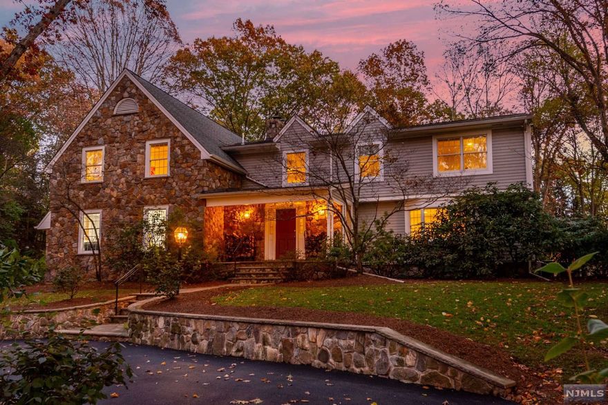 Welcome to spacious (approx. 4000 sq. ft.) updated home. Two story marble Entry Foyer, Formal Living Room, Formal Dining Room, Updated spacious Kitchen w/Skylights, Center Island, Lots of Cabinets, Doors to Deck, Patio overlooking private yard. Family Room w/Built-ins and WB brick fireplace. Guest Powder Room plus additional Powder Room and Laundry complete first floor. 2nd Floor Landing to Ensuite BR w/SS,Two additional bedrooms share updated bath w/SOT. Primary Suite w/custom walk-in closet. Also includes renovated Bath w/skylights, separate SS, Tub. C/A, Hardwood Floors, Circular Drive, Three car garage w/epoxy floor plus extra parking. 4 Zone GHWBB Heat, Generator