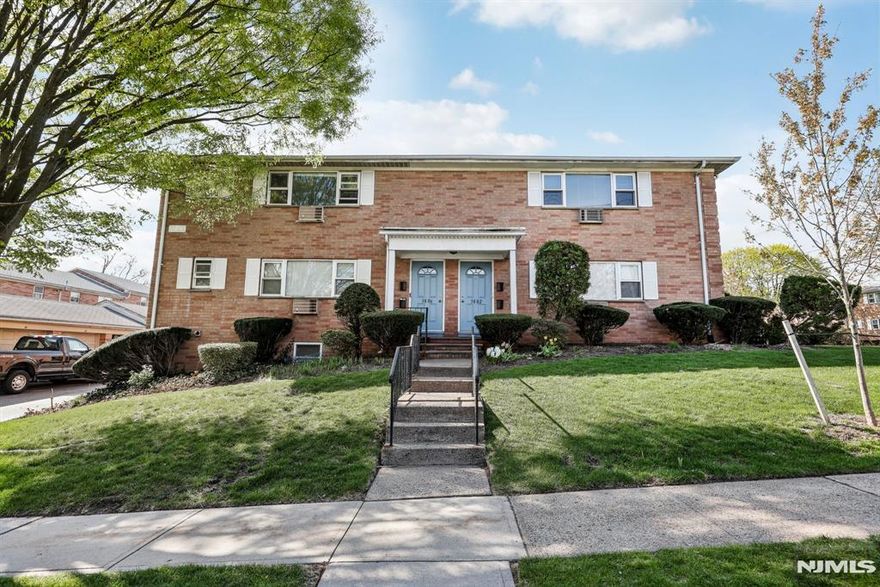 Bright, beautifully maintained and freshly painted condo at Blue Ridge Manor. Set in a quiet neighborhood with immaculate landscaping. Heat and water are included. Features include gleaming hardwood floors, a newly renovated kitchen with quartz countertops, and a dining area that flows into a spacious living room. The bathroom is tastefully updated with a marble vanity and range shower head. Enjoy the comfort of a new built-in wall air conditioner in the living room and generous closet space throughout. Conveniently located near NY transportation - Broadway Train Station and buses, shops, parks and major highways. Includes an assigned storage space. A must see!