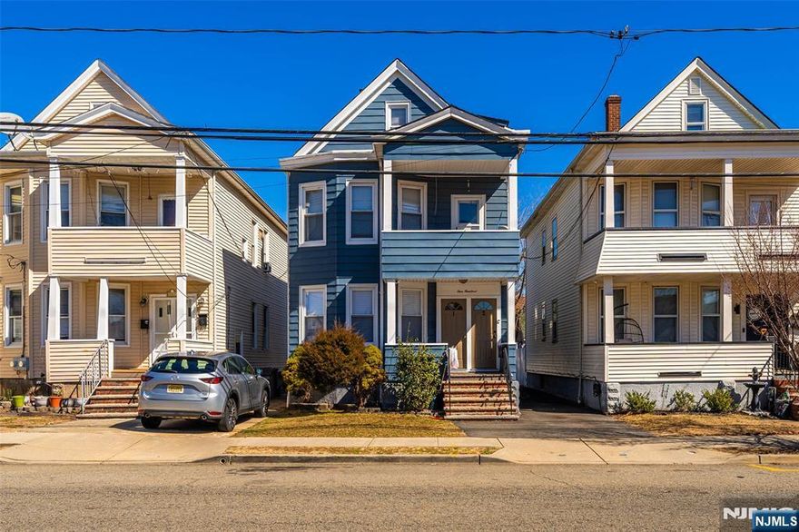 Welcome to this beautifully maintained two-family home in the heart of Garfield, NJ! Perfectly situated in front of Abraham Lincoln Elementary School, this home is ideal for homeowners and investors alike. Each unit boasts 3 bedrooms and 1 full bathroom. The second-floor unit offers exclusive access to the attic, perfect for extra storage or transforming into a cozy family or entertainment room. The fully finished basement adds even more living space, complete with a full bathroom, making it ideal for guests, a home office, or a recreational area. Renovated in 2018, this home combines modern updates with timeless charm. Additional features include a detached two-car garage, ample parking, and convenient access to major highways, shopping centers, and public transportationâ€”with a bus stop just steps away. Donâ€™t miss this fantastic opportunity to own a versatile and well-located property in Garfield! Schedule your private showing today!