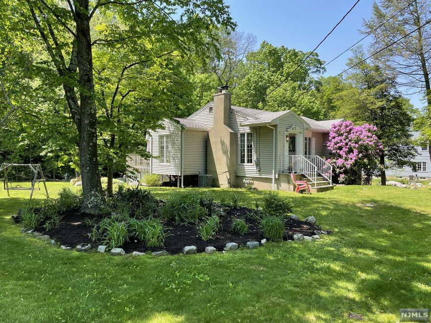 Welcome to your new personal paradise located on a large lot with easy access to major highways. This charming home provides plenty of outdoor space for all occasions with plenty of parking. Circular driveway provides easy in and out access to the main road. Enjoy the tranquility of your very own natural pond. Close proximity to Ringwood State Park, Monksville Reservoir and many other recreational areas. Look forward to barbeques during the warm months on a spacious deck. Enjoy the built in wood stove fireplace in the cooler months. Come enjoy basic country living in a suburban setting but yet close enough to nearby shopping and restaurants. Enjoy the Skyline Lakes community in close proximity and many other lakes in the area. Plenty to do and enjoy. Make this house your new home!