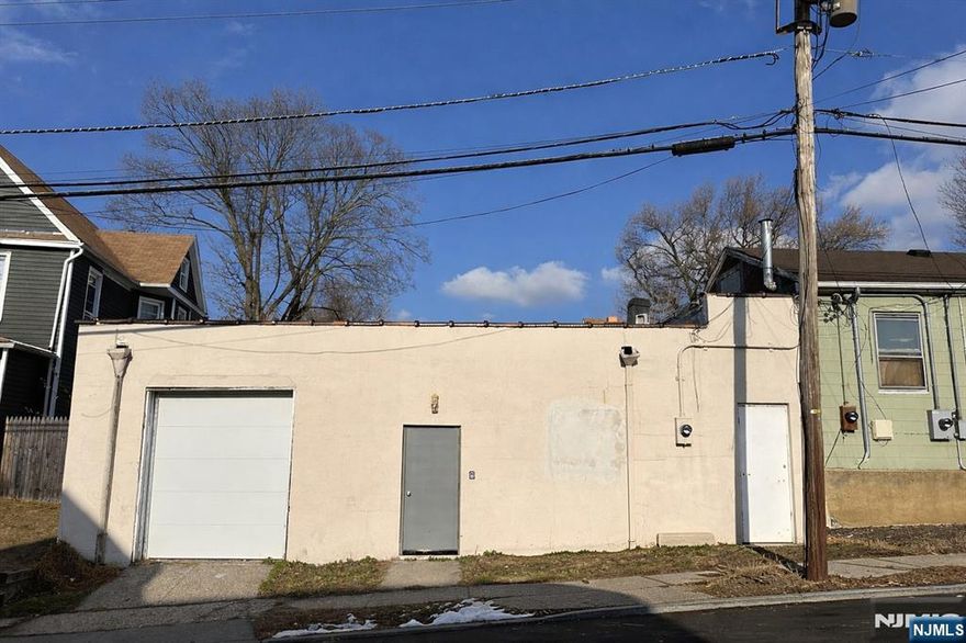 Ideally located just minutes from I-80, Route 46, and I-95, this renovated industrial unit offers excellent accessibility. The space features a main open area, one large room, a smaller room, one bathroom, and a drive-in door. An outdoor dedicated parking space is included. The unit is one of two within a single-story industrial property and is currently vacant.