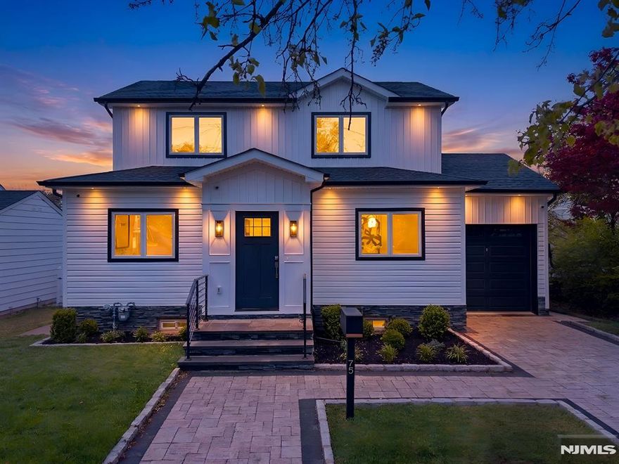 Discover modern luxury in this beautifully crafted new construction home, where refined design and high end finishes come together in perfect balance. Thoughtfully designed for both everyday living and stylish entertaining, this 4-bedroom, 3.5-bath residence offers elegant spaces, contemporary comfort, and timeless appeal. The main level welcomes you with elegant formal living and dining rooms, ideal for both everyday living and special gatherings. At the heart of the home is a stunning designer two toned kitchen featuring a quartzite waterfall island, stainless steel appliances, wine fridge, and sliding doors that open to a deck overlooking the paver patio and a spacious, fully fenced in backyard. Perfect for seamless indoor-outdoor entertaining. A first-floor guest bedroom and full bath add versatility for visitors, extended living, or multigenerational needs. Upstairs, the serene primary suite offers a private retreat with an ensuite bath, while two generously sized bedrooms, an additional full bath, & convenient second floor laundry complete the level with ease & practicality.The fully finished basement adds exceptional bonus space with a recreation room, half bath, den or home office, storage room and utility room. Finished with white oak hardwood flooring, solid core doors, modern details throughout & an attached one-car garage. This home is ideally located near major highways, NYC transit, shopping, dining & houses of worship. A home this special is not to be missed!