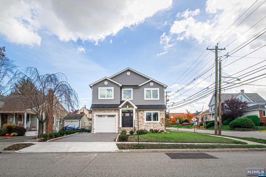 **THOMAS MCCARTHY 201-206-8144 & The Chen Agency** present: Your dream home awaits at 100 3rd Street. This thoughtfully designed, brand new construction 4 BR (3 en-suite) 4.5 bath home provides ample space for a private home office and the flow of this open floor plan is ideal for families. Boasting approximately 3000 sqft (including finished basement), 9 ft ceilings, beautiful molding, custom mill work, paver driveway lined with belgium block, generous landscaping, and an attached garage. The chef's kitchen features a stunning island topped with imported stone, Thermodor appliances, crisp white cabinetry, and stunning light fixtures. Enjoy your backyard from the porcelain tile patio. This modern home comes with a gas fireplace, tastefully designed bathrooms and a generous, vaulted ceiling master suite with a walk-in closet and center island. This beautiful, new home will sell fast, so come see it in person while you can! Call/ text TOM MCcCARTHY 201-206-8144 for all showings