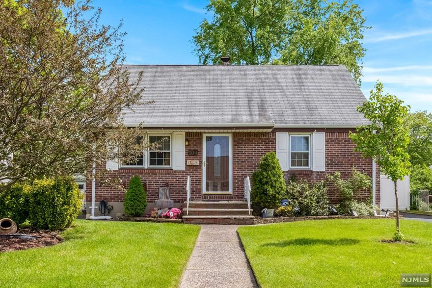 What a find! Charming and Modern Cape in the heart of Bergen County. Awesome condo or townhouse alternative. This 2 bedroom 1 bathroom home is completely move in ready with beautiful finishes and features throughout. Surprisingly spacious layout that could easily be converted into a 3 bedroom home if needed. Gleaming hardwood floors, recessed lighting, and crown molding greet you upon entry into the light and bright living and dining rooms. Modern kitchen with SS appliances, white cabinetry, and gorgeous tile backsplash. Renovated bathroom and a cozy bedroom complete the first level. Large primary bedroom upstairs, with a desk area or study at the top of the stairs. Large unfinished basement can definitely be finished in the future. Privacy fencing surrounds the large and green backyard. Room for two cars in the driveway. Close proximity to restaurants, shopping, and all major highways. Easy commuting into NYC from this location! Low Taxes are an added bonus.