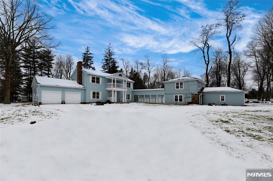 BEAUTIFUL COLONIAL NESTED ON 1.36 ACRE LEVEL LOT OFFERS 4 BEDROOMS AND 4.5 BATHROOMS. BRAND NEW SEPTIC IN 2023. FIRST FLOOR 2 STORY ENTRANCE FOYER, LIVING ROOM WITH WOOD BURNNG FIREPLACE, EAT-IN KITCHEN WITH ISLAND, SS APPLIANCES DOOR TO THE DECK, DINING ROOM AND FAMILY ROOM, POWDER ROOM,LAUNDRY. FINISHED BASEMENT WITH REC ROOM, BAR, FULL BATHROOM PERFECT FOR ENTERTAING. 3 CAR GARAGE. BREATH TAKING BREEZWAY SUNROOM CONNECTS MAIN HOUSE TO THE CARRIAGE HOUSE WITH 1 BEDROOM, 1 BATHROOM, KITCHEN, LAUNDRY ROOM/UTILITY ROOM, DECK. CARRIAGE HOUSE IS WITH SEPARATE ENTRANCE, SEPARTE UTILITIES. PROPERTY LOCATED 20 MIN FROM NYC BUS TRANSPORTATION, LOACAL SHOPPING. NEAR MOHAWK AND TOMHAWK LAKE, 30 MIN FROM THE MOUNTAIN CREEK SKI RESORT. MUST SEE! OWNER HOLD RE LICENSE.