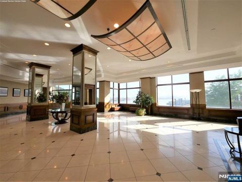 Photo of 100 Old Palisade Road #2411, Fort Lee, NJ 07024 (MLS # 25035245)
