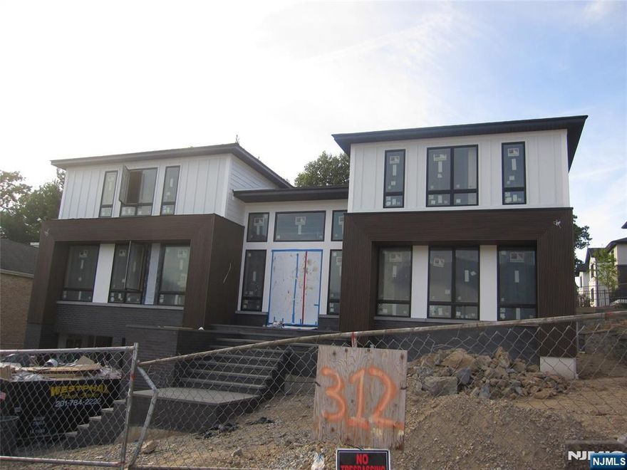 NEW CONSTRUCTION MODERN STYLE. OVER 6500 SQ.FT.OPEN FLOOR PLAN WITH 9FT. CEILINGS ON THE FIRST FLOOR. TWO STORY EF AND FAMILY ROOM WITH DOUBLE SIDED FIREPLACE, LARGE KITCHEN/DINING AREA, WITH QUARTZ ISLAND AND COUNTER TOPS, ALL STAINLESS STEEL APPLS, SUB-0 REFRIGERATOR. ALL BEDROOMS WITH EN SUITE BATH WITH RADIANT HEAT. PRIMARY SUITE WITH LARGE BEDROOM, FIREPLACE, LARGE CLOSETS, AND BATH WITH GLASS STALL SHOWER AND FREE STANDING BATH TUB. FIN BASEMENT WITH REC.ROOM WITH WET BAR, 1 BEDROOM, 1 BATH. OAK FLOORING, CUSTOMING CEILING AND STAIRWAY LIGHTING, PORCELANOSA TILES, SPEAKER SYSTEM,CAMERA SECURITY, C/AC,VAC, 3 CAR GARAGE, LANDSCAPING, GENERAC GENERATOR. SMART HOME FEATURES, CONTEMPORARY DESIGN, DEEP YARD AND A GREAT QUIET LOCATION. PREMIER BUILDER, BUILDING LUXURY HOMES SINCE 1981.