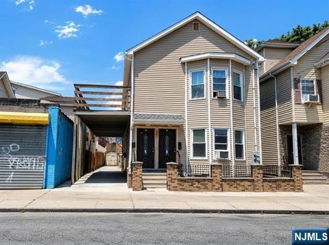 Photo of 47 Oak Street, Paterson, NJ 07501 (MLS # 26027889)