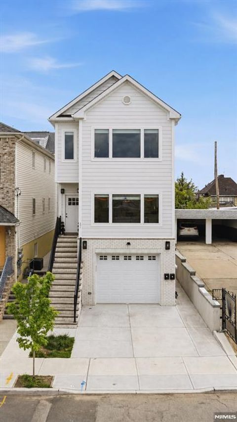 Photo of 31 Patterson Street, Harrison, NJ 07029 (MLS # 26014727)