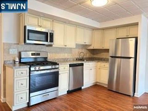 Photo of 283 Orchard St #1, Elmwood Park, NJ 07407 (MLS # 26025247)
