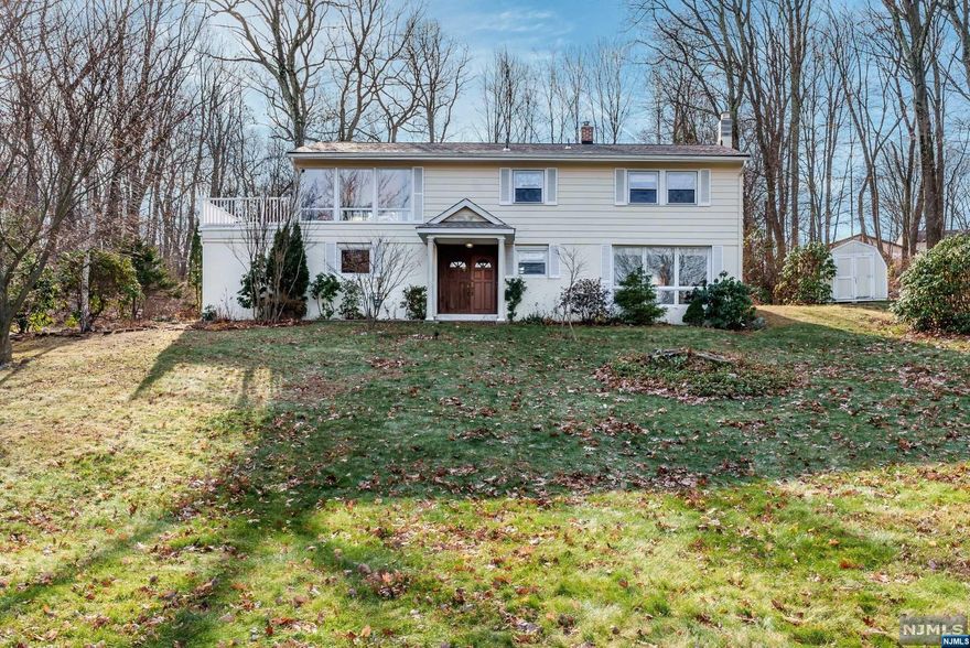 Tremendous Opportunity to live in a Million Dollar Neighborhood Close to Major Highways in a Fabulous Town with a Very High Rated School System Year After Year. This Custom Home Offers 3 Bedrooms with Hardwood Floors, 2 Full Bathrooms, A Grand Living Room with Hardwood Floors and Possible Office Space with Windows Surround for the Sunlight to Come Steaming Through. French Doors to a Spacious deck. The up-dated Eat-In Kitchen offers ample Maple Cabinets, a Newer Refrigerator, a Center Island and a Separate Dining area Open to the Family Room with a Woodburning Stove for those Cold Winter Evenings. A Main Level Laundry Room and 2 Car Garage for your Convenience. Newer Roof and Hot Water Heater. A Large Shed for extra Storage. Close to Schools, Shopping, Public Transportation, Parks, Golf Courses, Ski Resorts and only Approx. 35 Miles from New York City. BETTER HURRY ON THIS WONDERFUL OPPORTUNITY BEFORE IT'S TOO LATE!! MAKE THIS YOUR FIRST AND ONLY STOP!