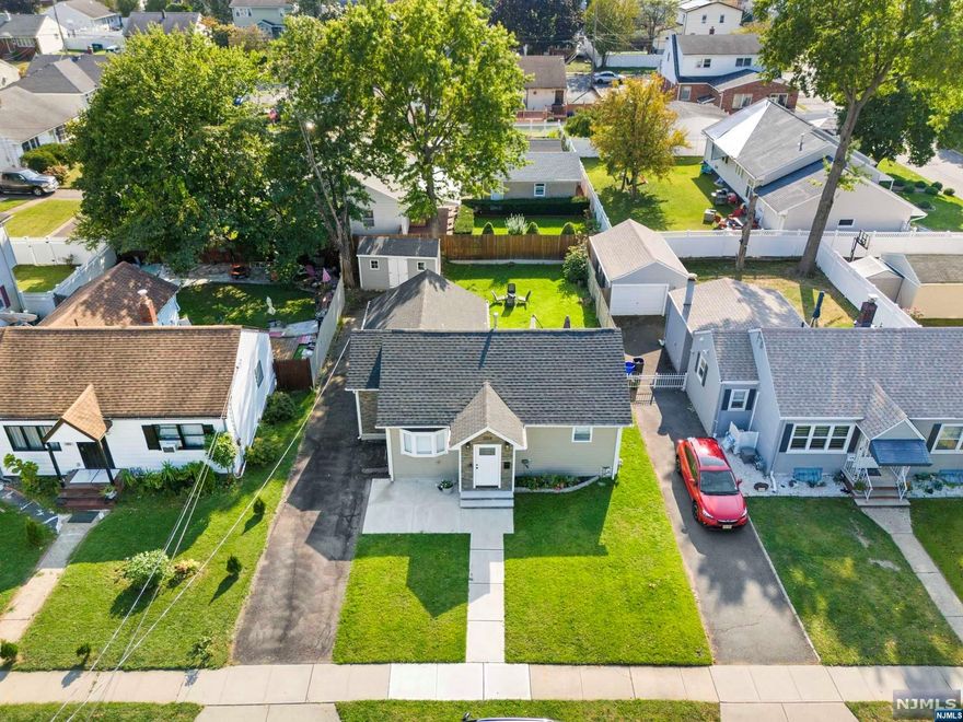 Welcome to this beautifully gut-renovated and expanded ranch-style home,offering both style and functionality.Featuring 3 bedrooms and 2 full baths,this home has been completely updated within the last two years,providing a modern,move-in-ready space perfect for new homeowners or those seeking the convenience of one floor living.The open layout provides a seamless flow through the living, dining,and kitchen areas,perfect for both entertaining and everyday living.You'll also appreciate the ample closet space throughout and additional storage in the attic.The fully finished basement offers additional versatility, with an extra room,a summer kitchen,a full bath,and a separate entrance ideal for extended family or guests.The property also boasts a spacious yard, perfect for outdoor activities and relaxation.Located in a great neighborhood,this home combines the best of convenience and peace of mind.Don't miss the opportunity to make it yours!