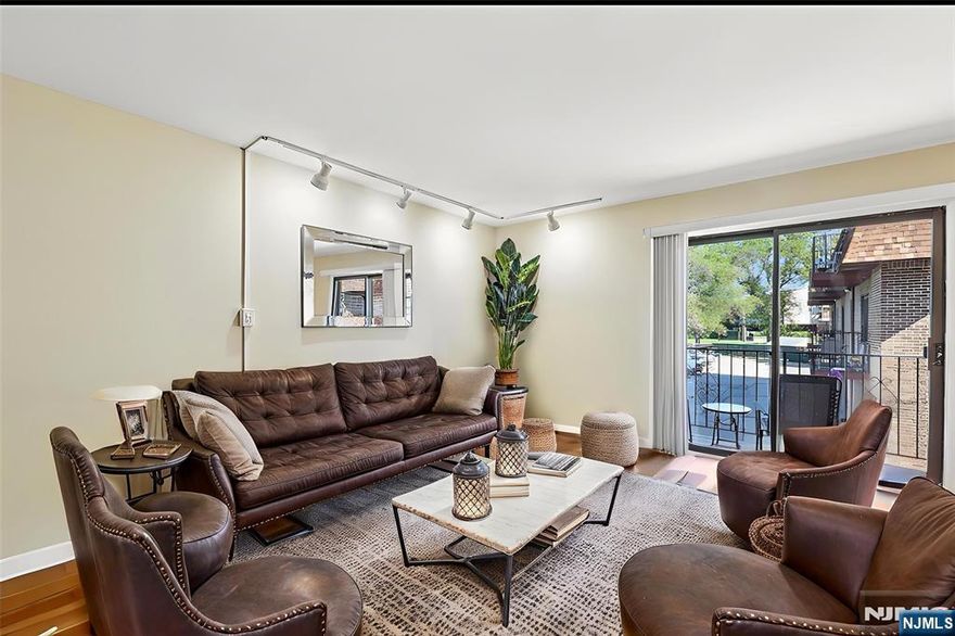 One of a kind, large and spacious sun filled condo with 2-bedroom, 2-baths in the desirable Wembledin Court. This updated condo with two floor living. The main-floor features a modern kitchen with granite counter tops and stainless steel appliances and laundry room. Large living room and dining room combo with balcony. Two large bedrooms and a full bathroom. Ground floor takes you to a large family room flowing into a bright open space with full bathroom and access to garage and sliding door to patio area. This condo is extremely large in size. Additional highlights include central air, Garage and Additional parking.