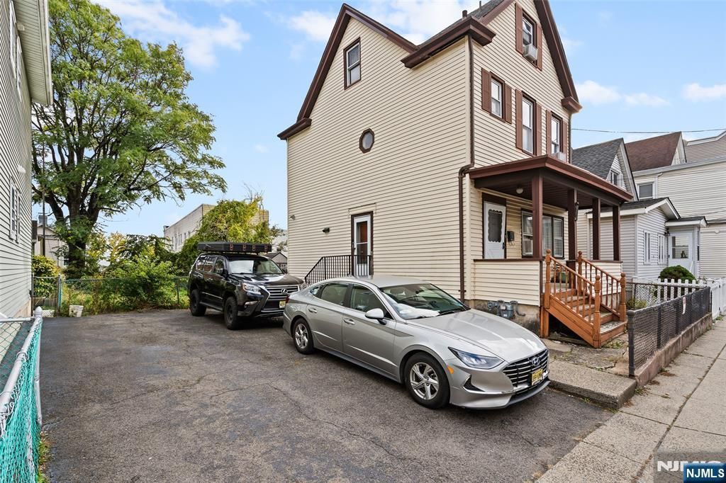 Photo of 49 Center Street, Clifton, NJ 07011 (MLS # 25037845)