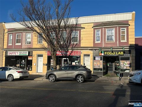 Photo of 218 Main Street, Ridgefield Park, NJ 07660 (MLS # 25043499)