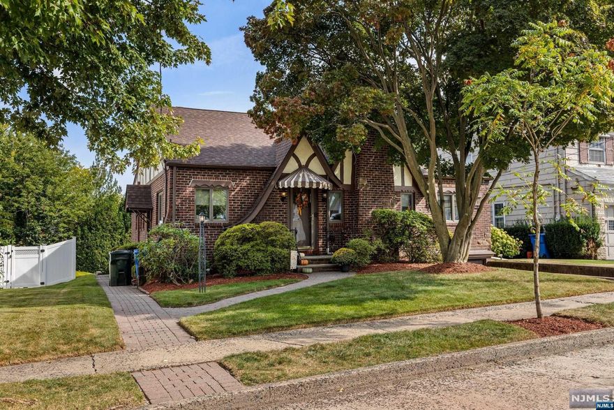 Nestled in the center of one of the most desirable streets in Rutherford, this stunning home boasts 3 spacious bedrooms & 2 full baths. It is enhanced by gleaming hardwood flooring, chestnut wood trim & a newly renovated kitchen. A cozy fireplace adds warmth to the inviting living spaces, while central air ensures comfort when needed. The full finished basement is a versatile highlight, featuring a large family room, kitchenette, full bath, laundry room, large storage room and a utility room. Recent upgrades include a new roof, central air & a new hot water heater. A spacious, 2-tier private backyard with a paver patio makes for ideal outdoor entertaining. This home is a perfect blend of architectural elegance & creative flair with unique details throughout. It is situated in a community celebrated for its excellent schools, rich cultural diversity & vibrant downtown area and near transportation to NYC. Make this home not just a place to live but a wonderful lifestyle choice