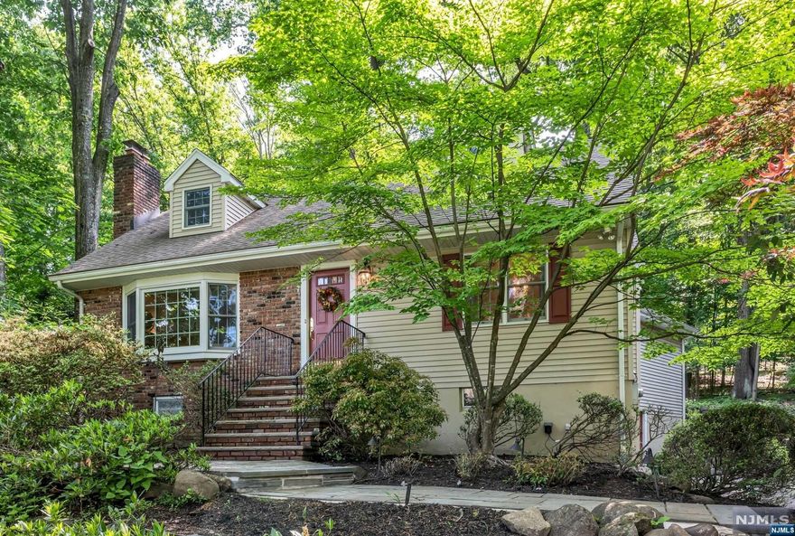 Beautifully maintained custom expanded home in perfect, pristine condition! Conveniently located across the street from the beach path to Pines Lake south beach! Great space and layout featuring a lovely 1st floor Primary Suite with private bath, multiple closets and door to rear patio! Warm and inviting living room with bay window and gas fireplace connects to a large dining room with loads of light! The heart of the home is the expanded family room off the kitchen with dining area, built-ins, and door to a quaint and private rear patio. Powder room off hallway. 2nd floor boasts 2 additional tandem bedrooms full of charm plus full bath. Lower-level leads to the 2-car attached garage, laundry, utilities, plus large bonus boat storage room with outside entrance. Come enjoy the Pines Lake Lifestyle including boating, fishing, swimming, tennis, pickleball, volleyball, social events, the beach and more!