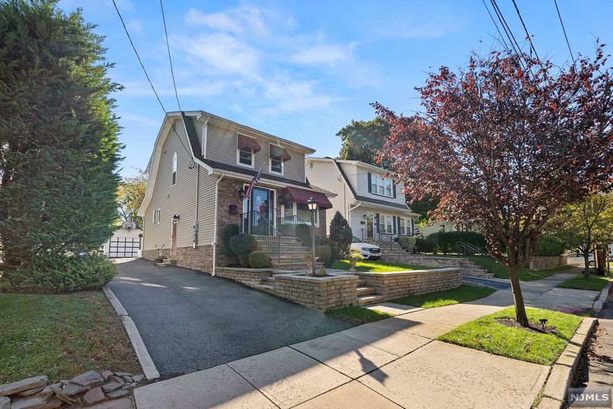 Move right in to your fully updated home in Nutley's desirable Yantacaw section. This contractor's home has left no stone unturned with quality updates throughout. Upon entering, you'll immediately notice the main floor's room size and open layout. Next appreciate the craftsmanship with crown molding throughout the home and the dining room's wainscoting. A stunning center island kitchen with Viking appliances will undoubtedly be the gathering place for you and your guests. The second floor offers 3 bedrooms including a primary bedroom with vaulted ceilings and an additional bedroom with built in shelving that can be used as a walk-in closet. A fully finished basement offers all the extra space you could need. Enjoy indoor/outdoor living through the glass sliding door off the kitchen out to your backyard patio. The tree-lined lawn and detached garage offer the beauty and function every backyard needs. Enjoy evening strolls through nearby Memorial Park.