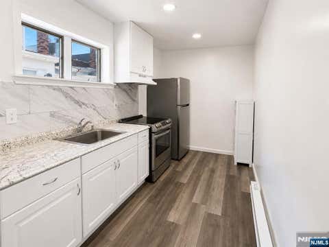 Photo of 131 Hudson ST #REAR BUILDIN, Hackensack, NJ 07601 (MLS # 26031854)
