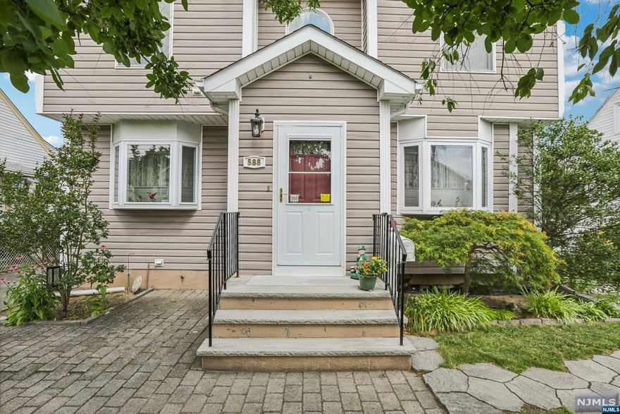 A MUST SEE, This move-in ready home showcases exceptional pride of ownership, boasting numerous updates that enhance its charm and functionality. Hardwood floors throughout, 4 spacious bedrooms, 2 full bathrooms, great EIK with access to deck and yard perfect for entertaining, 2nd floor overlook balcony is truly unique, the generous closet space throughout ensures plenty of storage. Natural sunlight abounds, creating a warm and inviting atmosphere. Located in an excellent school district, it's perfect for families prioritizing education. Situated on a tranquil, tree-lined street, the home offers a serene environment while being conveniently close to public transportation and major highways, making commuting a breeze. The combination of comfort, convenience, and style are ready for its next owners to move in and enjoy. Recent upgrades / improvements include central a/c, over sized windows, water softener, double osmosis drinking water system, hot water heater replaced in 2021