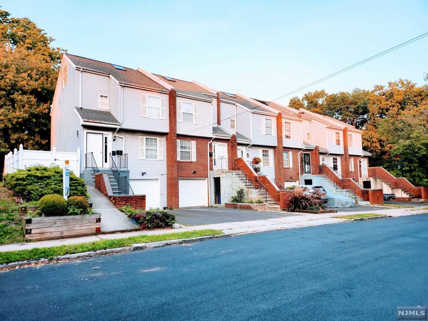 Looking for the townhouse feel without the expensive community fees and shared amenities? Well look no further! This beautifully renovated home provides you with 3 bedrooms, 1 full bath, two half baths, finished basement and a sizable private backyard for your enjoyment. This home boasts a newly renovated kitchen with brand new: cabinets, back splash, refrigerator, stove, microwave, quarts counter tops, and air vents. This house also comes with a newly renovated powder-room: including new sink & vanity, new toilet & paint. All bedrooms and 2nd floor staircase has brand new carpeting while the living/dining room area retains its gleaming hardwood floors. There's also brand new flooring throughout the kitchen and foyer areas. There are updated light fixtures, outlets and blinds throughout. This house also comes with a new (2022) water heater and the HVAC system was replaced in 2020. To top it off, the entire house is freshly painted from top to bottom!