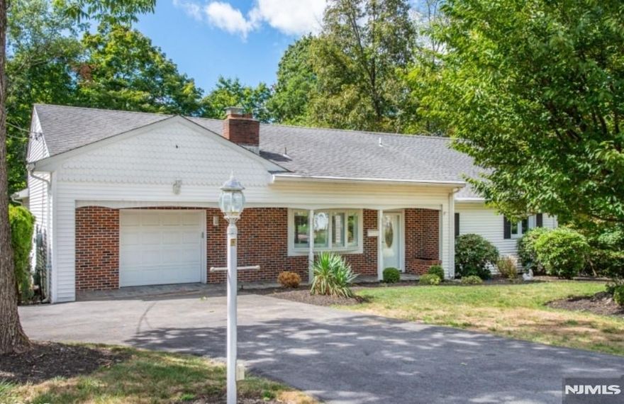 Call Reiley Phelan for all showings and info 201-951-4877. Welcome to this meticulously maintained rental home located in highly desirable Packanack Lake! This charming 2-bedroom, 2-full-bath ranch offers true one-floor living with no stairs, making it both convenient and comfortable. The home features an open-concept living and dining area highlighted by a cozy gas fireplace and a wall of windows that flood the space with natural light while offering peaceful views of the oversized deck perfect for relaxing or entertaining. The spacious eat-in kitchen boasts a cathedral ceiling with skylight, ample cabinetry, breakfast bar, a pantry, and easy access to the laundry room and oversized one-car garage. The primary bedroom includes a private en-suite full bathroom, while a second full bath serves guests or the additional bedroom. Situated on nearly half an acre, the property offers generous outdoor space in a serene setting. A wonderful opportunity to enjoy comfortable, low-maintenance living in a prime location. Enjoy all the benefits of Packanack Lake living: highly walkable 2.5 miles around, 2 beaches, ball fields, tennis, pickleball, 9-hole golf course, 2 clubhouses (year-round events and rentable), sports&clubs! PLUS "Lake Drive Tavern" with an upscale comfort food menu coming Spring 2026!