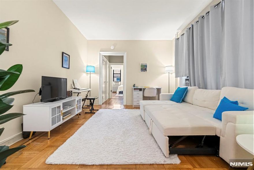 Easy living for the professional commuter. Minutes to and from NYC with express transit at your door step. Enjoy New York skyline views every morning. Charming 1BR/1BA in the Art Deco Riverview building on iconic Blvd East. Approx. 700 sq. ft. with hardwood floors, high ceilings, and a windowed eat-in kitchen featuring a new stainless steel gas range. Quiet rear-facing unit with a sun-filled bedroom and south/west exposure. Well-maintained, pet-friendly building with elevator, full-time super, laundry, storage, and a gated resident courtyard with BBQs and garden seating. Maintenance includes heat, water, sewer, and taxes. Prime commuter locationâ€”NJ Transit bus at your doorstep, close to Light Rail & NY Waterway. Steps from shops, cafes, and dining. Make 1055 Riverview your next home.