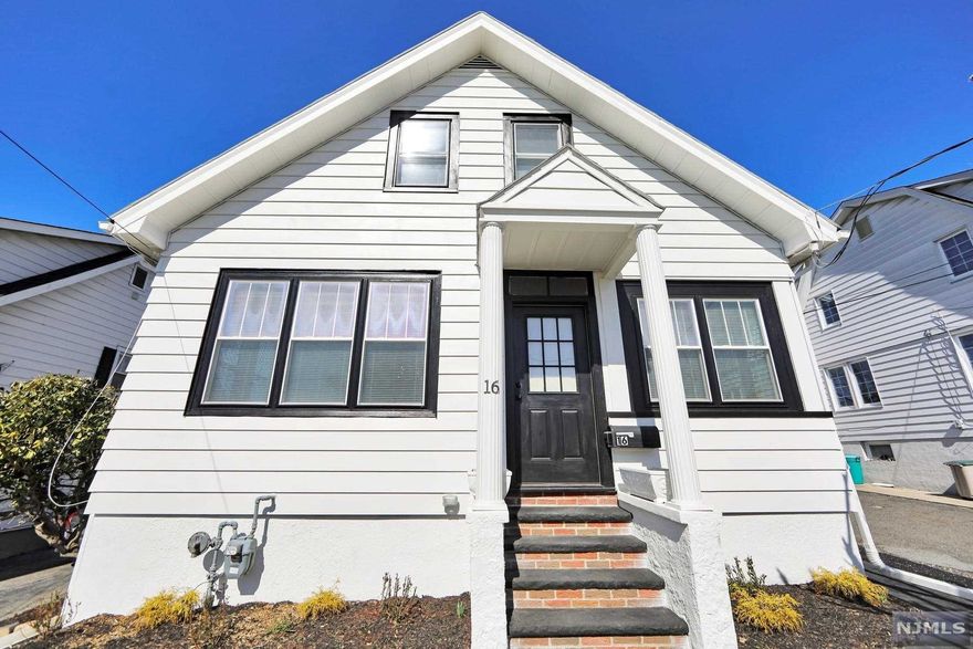 Beautifully Renovated Home from top to bottom with 4 Bedrooms, 2 Full Baths on a quiet street with beautiful Lake views! Walk in to the warm and sun filled, brick floored Sun Room open to the Living Room with 10 ft ceilings, spacious Dining Room open to the Newly renovated Kitchen with Breakfast bar, all New Appliances, Quartz Countertops, walk in Pantry and sun filled Breakfast Room. Two nice sized Bedrooms with 10 ft ceilings and newly updated full bath with soaking tub complete first floor. Second floor offers another Bedroom and Master Bedroom with Master Bath that has access to hallway also. Full unfinished basement with epoxy floor, Laundry area and access to backyard. 3 Car Detached garage with loft area, yard with view of the Lake and Patio area great for entertaining! A Move in ready home! A must see!