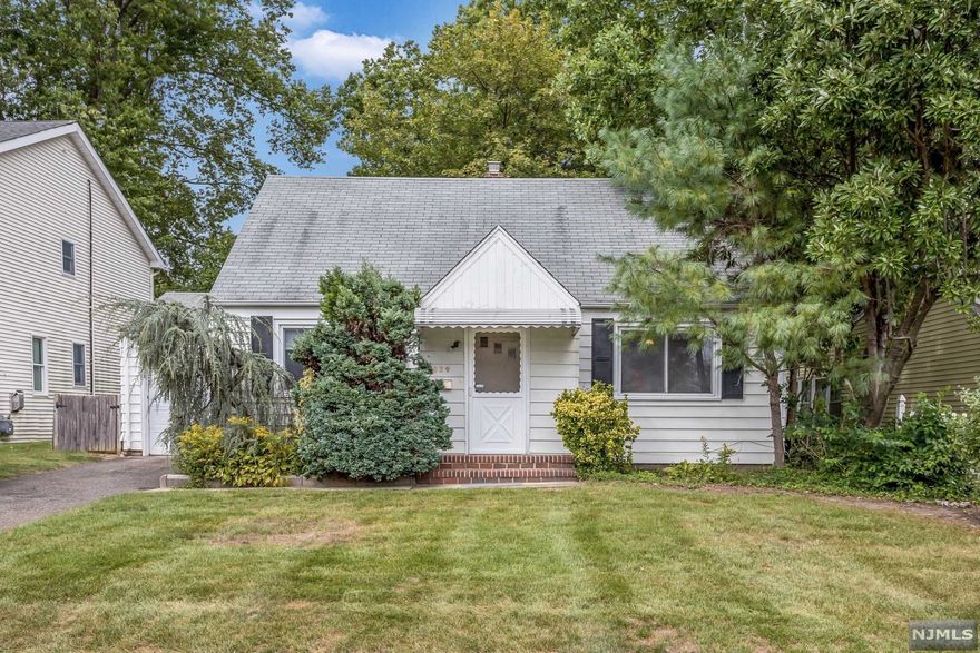 Lovely cape in an extremely desirable neighborhood in sought after school district. This house sits on a wonderful tree lined street! Beautiful floors throughout. First floor features large living room that flows nicely to the formal dining room, modern eat in kitchen with sunny breakfast area and bar, plus cozy family room w/ outside entry to private yard. Family room also has convenient entry to attached garage. Master bedroom has been freshly painted and has a new floor, plus additional bedroom with brand new carpet on first floor, and a full bath. 2nd level boasts two additional bedrooms and a full bathroom. Full basement semi finished offers laundry, work area, and good potential for a recreation room/office. New hot water heater in 2020. Central air conditioning on first floor. Highly coveted for its proximity to houses of worship, parks, schools, Radburn shops, public trans and proximity to NYC. House is being sold as is. Enjoy all Fair Lawn has to offer. A real gem!