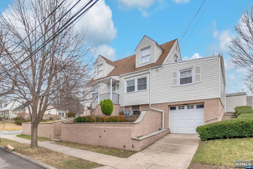 Welcome to this beautifully renovated multi-family house in Rutherford! Situated on a corner lot, this property features 4 bedrooms and 2 full bathrooms, along with a large side lot perfect for outdoor entertainment. The highlight of this home is the finished basement, complete with two additional bedrooms, a kitchenette, and a full bathroom. The basement also includes a laundry and storage area, providing ample space for all your needs. With an attached garage for parking and additional parking available, you'll never have to worry about finding a spot on the street. Enjoy the convenience of being close to major highways and public transportation, making your commute to NYC a breeze. Don't miss out on this incredible opportunity to own a beautifully updated home with easy access to all that the area has to offer. Schedule your showing today!