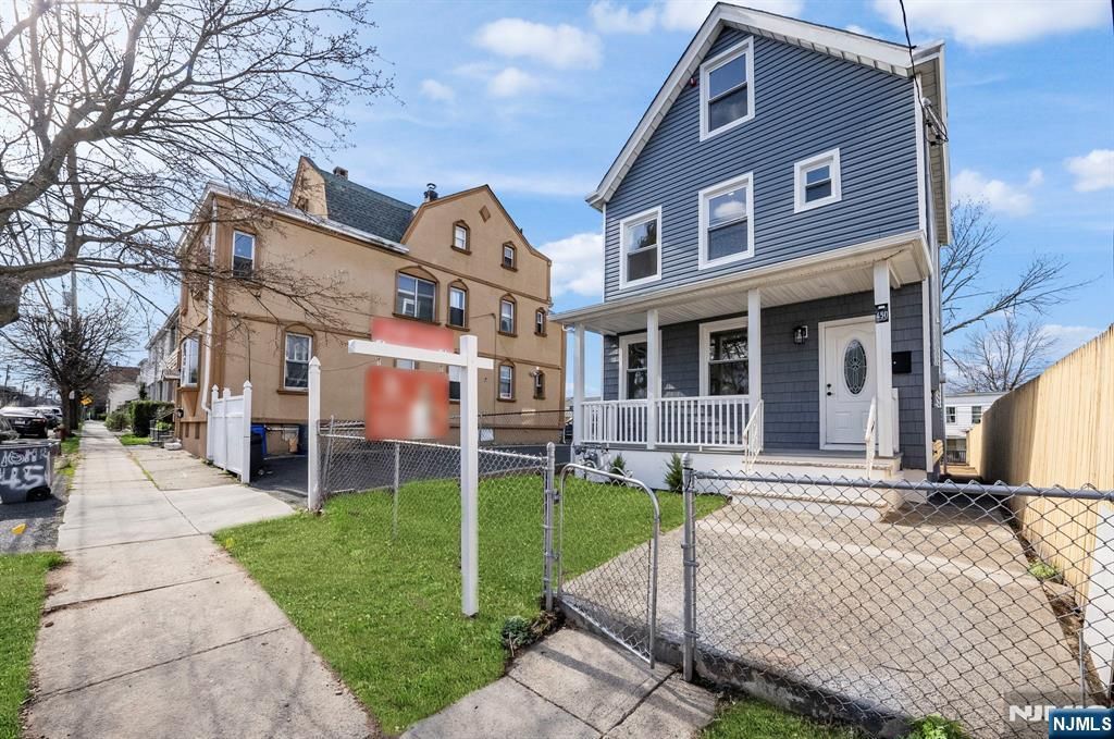 Photo of 450 Highland Avenue, Passaic, NJ 07055 (MLS # 26012769)