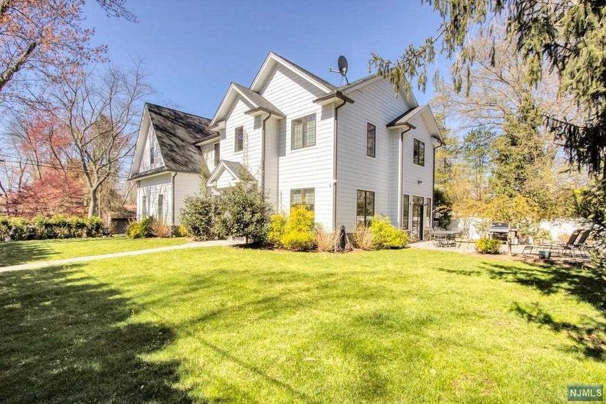 BEAUTIFUL COLONIAL SITUATED ON THE EAST HILL OF DEMAREST FEATURING 5 BEDROOMS, 4 FULL AND 1 HALF BATH. TWO-STORY ENTRY FOYER, HARD WOOD FLOORING THROUGHOUT, HIGH CEILINGS, LARGE FORMAL LIVING ROOM AND DINING ROOM, GOURMET KITCHEN WITH LARGE CENTER ISLAND, VIKING APPLIANCES AND BREAKFAST AREA FLOWS EFFORTLESSLY INTO THE FAMILY WITH FIREPLACE AND ACCESS OUT TO THE REAR PATIO AND YARD, POWDER ROOM AND TWO CAR GARAGE COMPLETE THE FIRST FLOOR. PRIMARY SUITE WITH LARGE SPA-LIKE BATHROOM, HUGE WALK IN-CLOSET AND DRESSING AREA, EN SUITE BEDROOM PLUS TWO ADDITIONAL BEDROOMS, HALLWAY BATHROOM AND LAUNDRY. LOWER LEVEL FEATURING HIGH CEILING, LARGE REC AREA, BEDROOM, FULL BATHROOM AND STORAGE. GREAT LOCATION, BLUE RIBBON SCHOOLS, EASY COMMUTE TO NYC CLOSE, TO SHOPPING AND DINING. AMAZING OPPORTUNITY TO LIVE IN DEMAREST!!