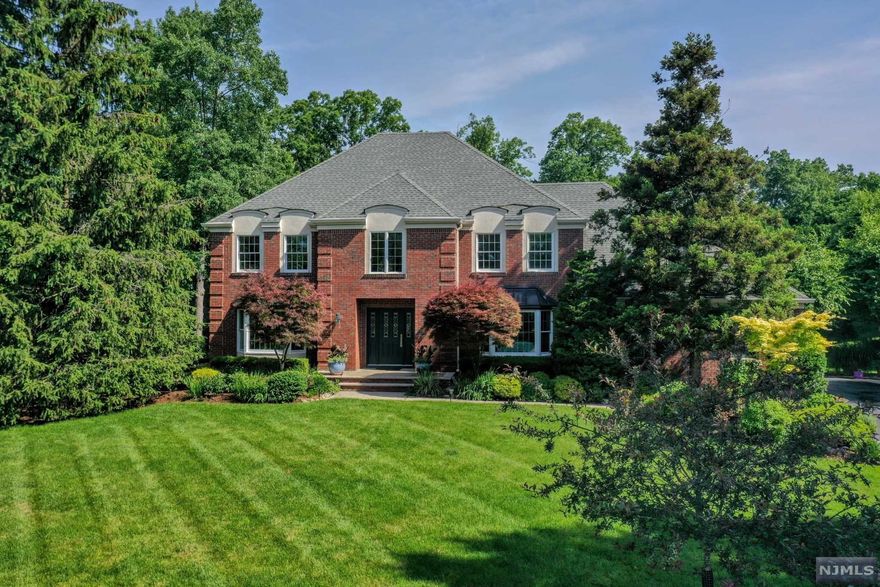 Welcome to a "Corner of Paradise"...A golden opportunity to own a magnificent single family home in the highly sought-after community of Apple Ridge. Located on a private cul-de-sac among lush green areas, this spacious, light & bright 4 bedroom 21/2 bath home has the perfect open-feel floor plan. The inviting cathedral ceiling entry foyer leads the eye to a warm wood-burning fireplace in the gorgeous family room open to the kitchen bathed with warm rays from the skylight. Breakfast or parties on this composite deck overlooking the backyard with a pristine lawn and landscaping gives the relaxed feel of being constantly on vacation. Upstairs, the luxurious radiant heated full bathrooms, the huge owner's suite with walk-in closet & 3 generous additional bedrooms will not disappoint. The walkout open plan rec room & office in the basement is amazing with endless possibilities. In addition, Enjoy the heated pool, tennis, playground, gym and clubhouse that this community has to offer.