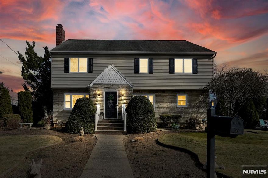 WELCOME TO THIS LOVELY COLONIAL HOME, PERFECTLY SITUATED ON A QUIET DEAD-END STREET THAT LEADS TO GRANT PARK. THE PERFECT BLEND OF PRIVACY & CONVENIENCE WITH MAIN ST. AND ORADELL TRAIN NEARBY, COMMUTING AND ERRANDS A BREEZE! STEP IN TO A SPAC. LR FEAT. A WOOD-BURNING FP, PERFECT FOR COZY EVENINGS. THE EIK HAS BEEN NICELY UPDATED WITH NEW WD FLRS, QTZ CTR, A MODERN SINK & FAUCET & PANTRY FOR MORE STORAGE. A MUDROOM AT SIDE ENT ADDS CONVENIENCE AND FUNCTION. THE BRIGHT AND INVITING DR IS IDEAL FOR HOSTING DINNERS, WHILE A DEN OFFERS FLEX SPACE FOR LOUNGE, OFFICE OR A 5TH BDRM IF NEEDED & IS NEXT TO THE UPDATED 1ST FLR BATHROOM. UPSTRS YOU'LL FIND 4 GENEROUSLY SIZED BDRMS; THE PRIMARY W ACCESS TO UPDATED HALL BATH. TONS OF CLOSETS THRU-OUT! A NEW PULL-DOWN STAIRCASE LEADS TO A SPAC ATTIC W/11' CEILINGS. THE UNF. BSMT PROVIDES PLENTY OF ROOM FOR LAUNDRY, STORAGE, A GYM OR PLAYROOM. FEAT: SPRINKLERS, PROF LNDSCPD, FENCED YARD, C/A, HWBB 2 ZONE HT & NEW WIN 1ST FLR. DON'T MISS THIS GEM!