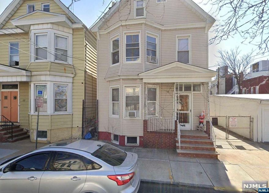 Spacious two-family house for sale featuring a well-maintained 1st floor with 2 bedrooms, 1 bathroom, eat-in kitchen, and living room. The 2nd floor offers 3 bedrooms, 2 bathrooms, along with an eat-in kitchen and living room. Laminate floors throughout the property add a modern touch. The house includes a driveway that accommodates 4 cars on a double lot. Enjoy the convenience of a finished basement with a laundry room and recreation area. The property boasts a large backyard.