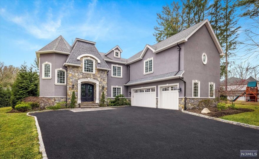 Built in 2016 & beautifully designed/curated by these current owners with many high end finishes & upgrades-you don't want to miss this high quality new construction! High grade stone facade & true masonry stucco, with a gorgeous covered rear veranda & professional landscaping, create a beautiful ambiance & setting for this stunning home. Dramatic 2 story entry foyer & great rm open up to a dream kitchen w adjacent breakfast rm w access to veranda. Beautiful crown moldings throughout & coffered ceilings in the Great Rm & DR. All the spaces todays' buyers are looking for including oversized mudroom & first flr guest room/den/playroom. Upstairs, spacious landing area plus 4 BRs & 3 full bathrooms, including a spectacular primary suite w tray ceilings, his/her walk-in closets, gas fpl & a spacious primary bth. Incredible addt'l space with magnificent lower level that includes home office,guest BR,full bath,home gym and oversized rec room. Spacious private rear yard! Don't wait!