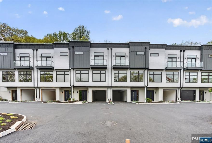 Discover modern living in these newly constructed luxury townhouses, designed with elegance and functionality in mind. Each home offers 3 spacious bedrooms and 2.5 bathrooms, providing the perfect balance of comfort and style. Enjoy the convenience of a 2-car tandem garage on the entry level, ensuring ample parking and storage space. The main living areas are thoughtfully designed with open layouts, creating an inviting flow for both everyday living and entertaining. Upstairs, the third floor hosts the bedrooms and a dedicated laundry area, adding ease to your daily routine. The primary suite features a spa-inspired bathroom, complementing the modern finishes throughout the home. The highlight awaits above: a private rooftop terrace on the fourth floor, ideal for entertaining guests or relaxing under the stars. With room for outdoor dining, lounging, and enjoying panoramic views, this rooftop retreat truly sets these townhomes apart. Experience the perfect blend of sophistication, comfort, and convenienceâ€”your dream home awaits.